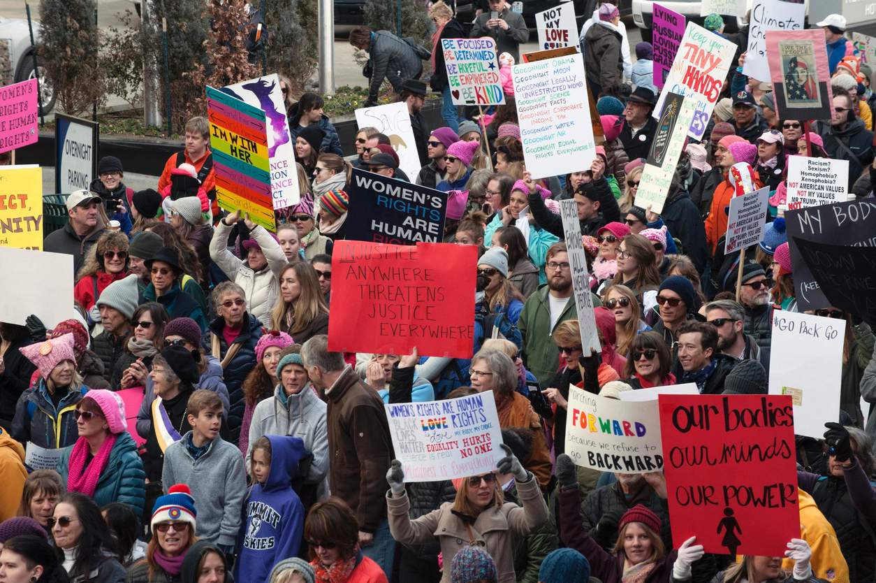 women protest anti-trump in denver