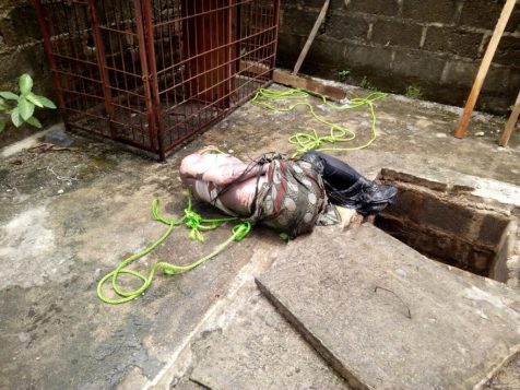 The body of a yet to be identified Jumia agent in a septic tank