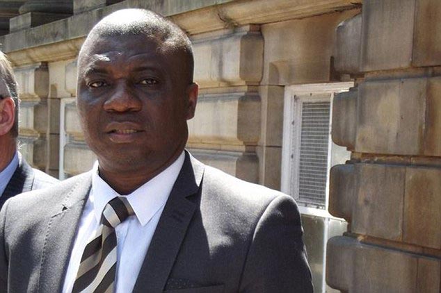 Dr Abiodun Olumuyiwa Bale, 42, denied being a 'thug' despite pulling the woman back as she attempted to leave his consulting room.