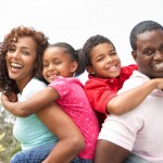 Portrait of Happy Family In Park