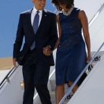 U.S. President Obama and the first lady walk down from Air Force One upon their arrival in New York