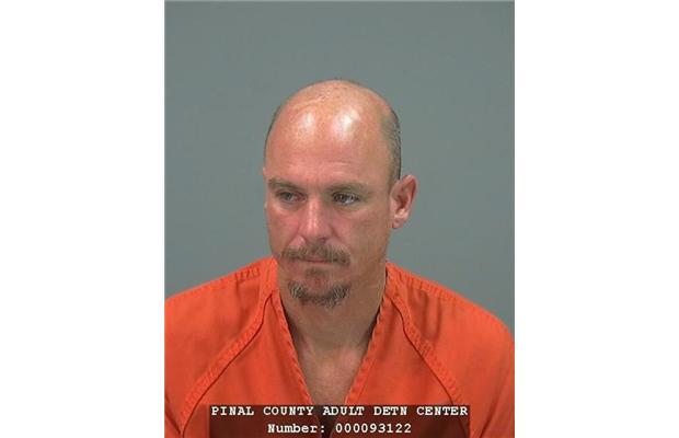 Joseph Andrew Dekenipp escaped by climbing two walls and crawling through razor wire, officials say.