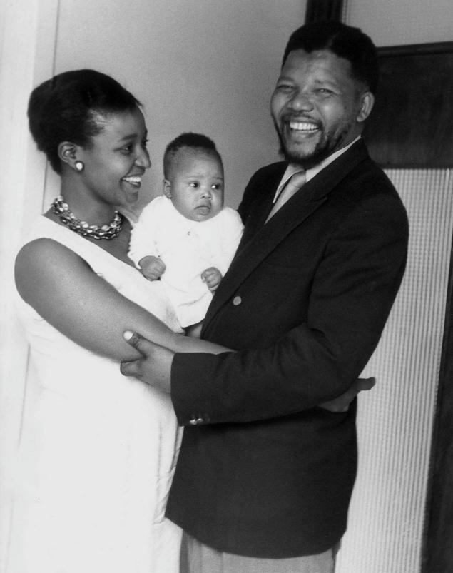 Nelson and Winnie Mandela show off their first-born daughter, Zindzi, at their home in Orlando West, Soweto, in 1961. (ALF KHUMALO/AP)