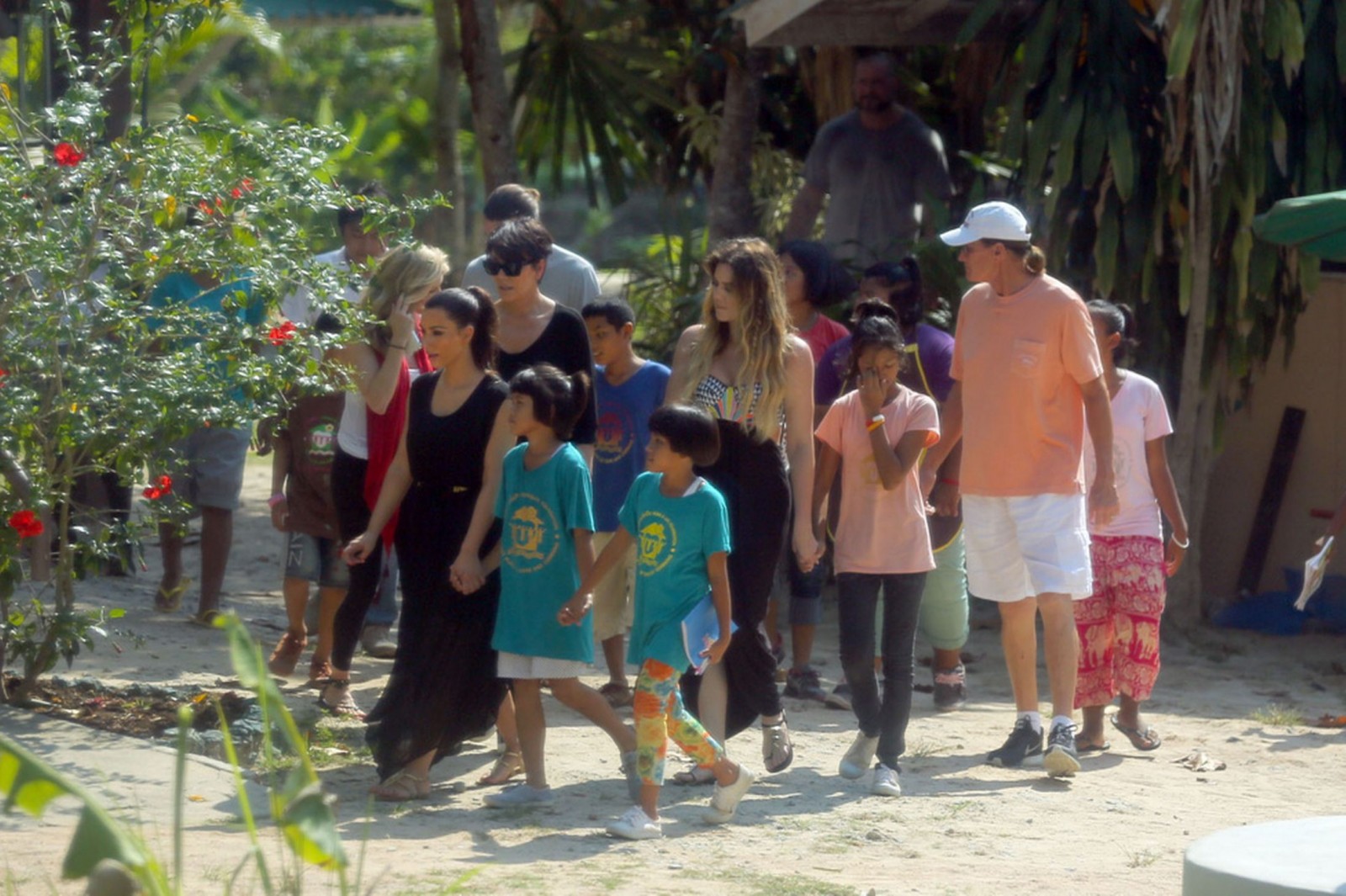Kim and her family were see walking through a local village (Photo Credit: Slash/Daily Mirror)