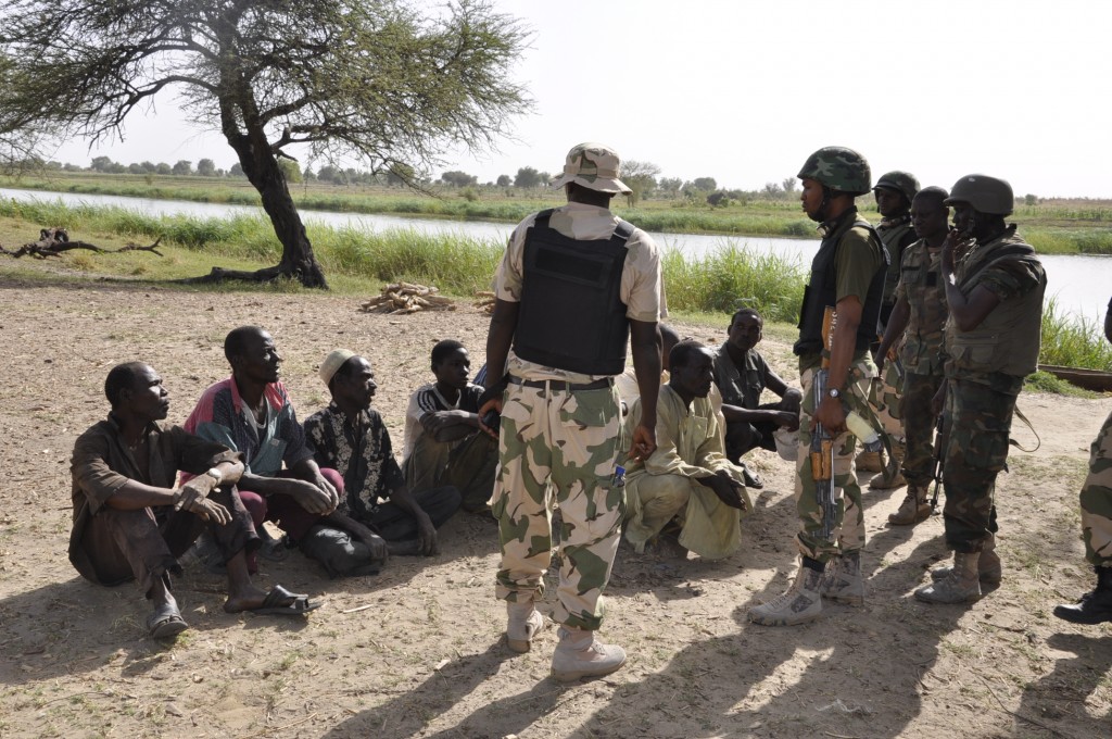 Troops interrogating some arrested-terrorists