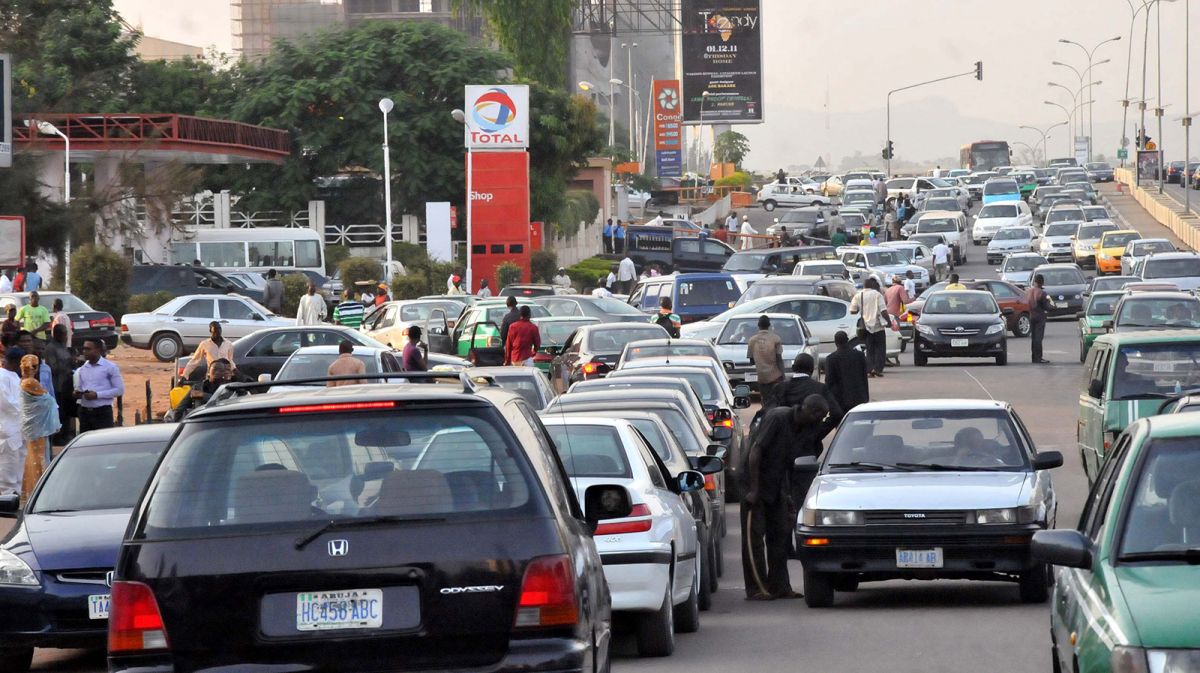 car owners, NNPC A petrol station during fuel scarcity in Abuja tanker