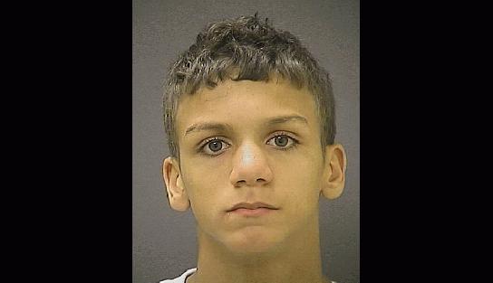Solomon Pule in a mugshot