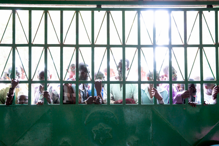 Bangui. Displaced muslims listen to public speech both from the minister of reconciliation and the Imam after a friday pray at PK5 muslim enclave main mosque where several XXX thousands displaced muslims stay in the mosque courtyard. (Photo Credit: William Daniels/Panos)