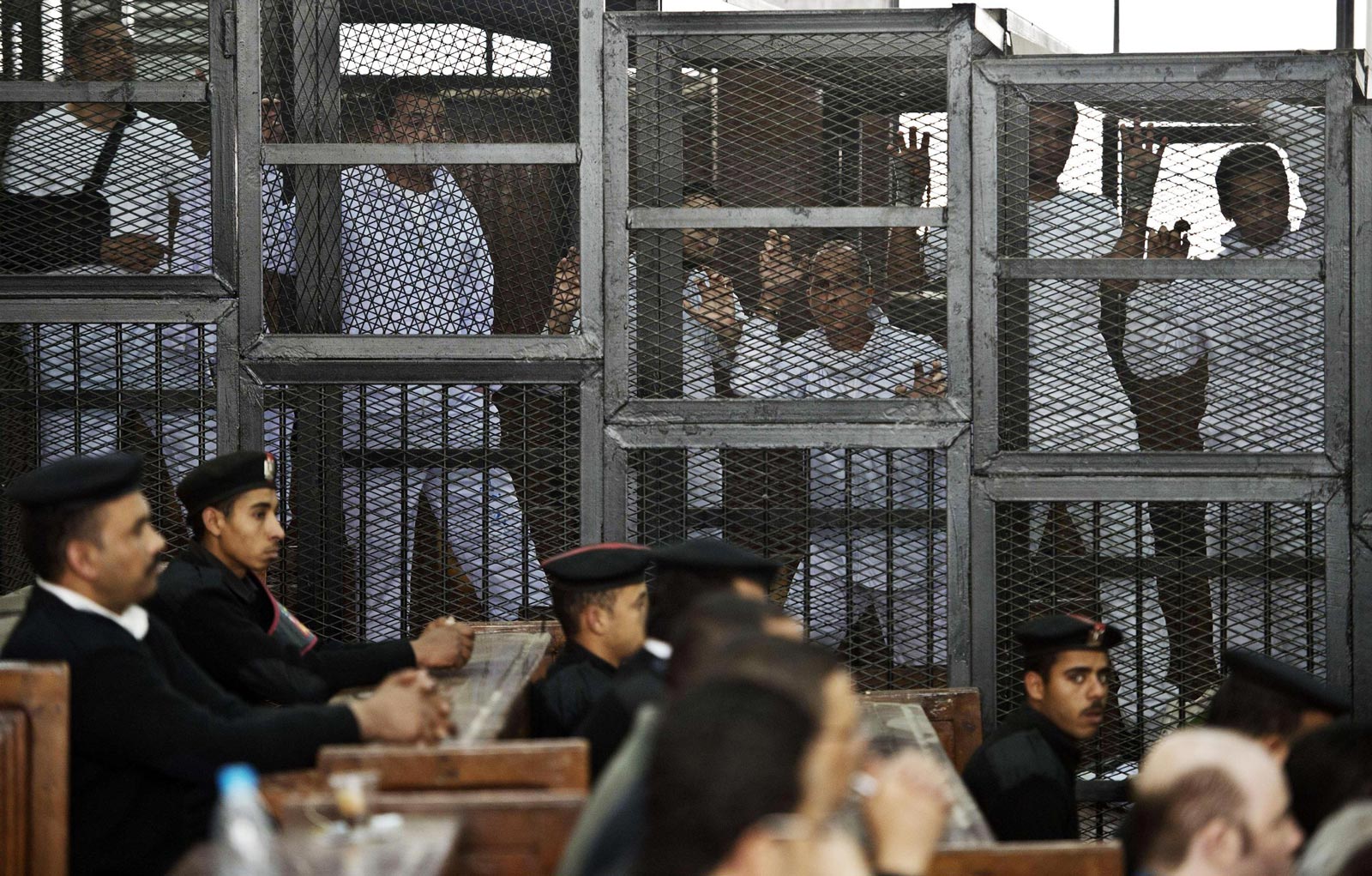 140305-egypt-court-trial-10a_f6db858106379fd2aa32ba5a032853f4
