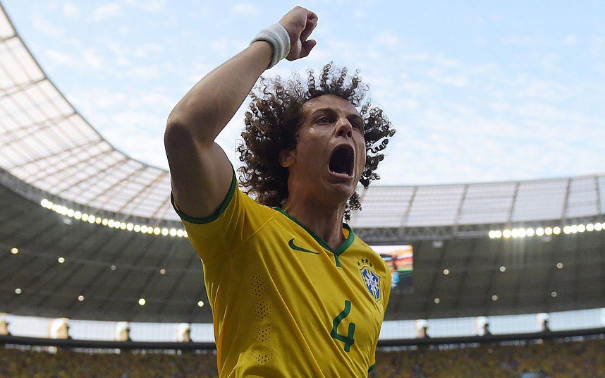 Roraing success: Luiz reeled away in celebration after scoring his goal (Photo Credit: AFP)
