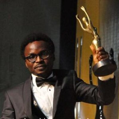 Director, Eric Aghimien receiving the Prize for Achievement in Visual Effects at the 2014 Africa Movies Academy Awards (AMAA)