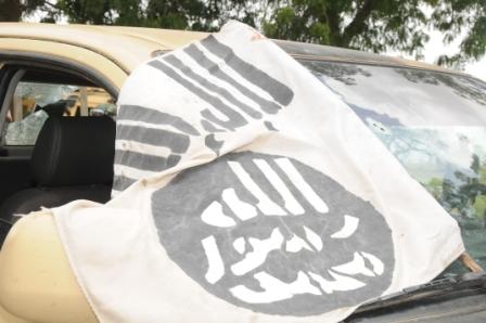 Flag of the terrorists on one of the captured vehicle by Nigerian troops in Konduga