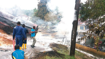fire fighters putting off inferno caused by fuel tanker explosion in Calabar on September, 17, 2014 (Photo credit: Mudiaige Affe)