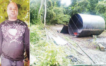 Junaid and the illegal refinery in Ogun State( Photo Credit: NFF)