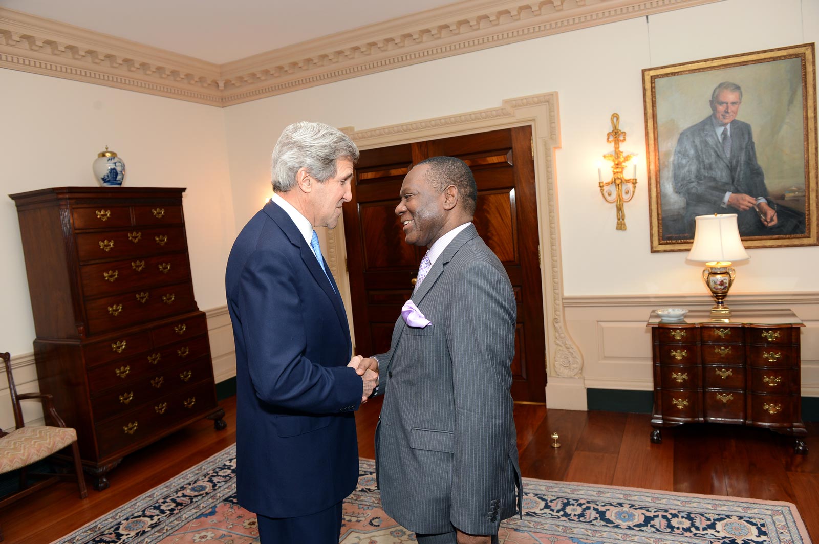 Olugbenga Ashiru, Nigeria's Foreign Affairs Mininister shakes hands with Us Secretary of State John Kerry at a bilateral meeting at the US Department of State in Washington DC on April 25, 2013 (US Government Photo)
