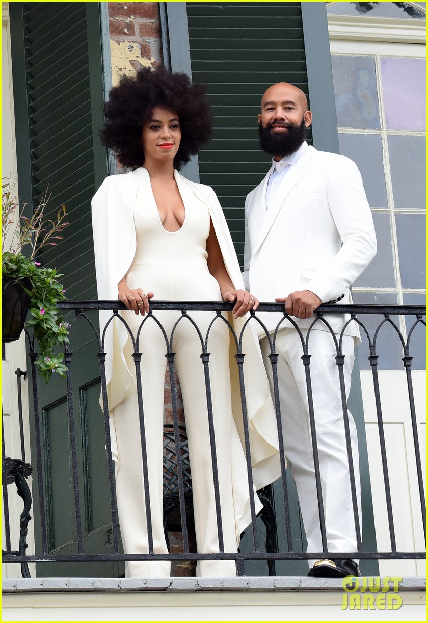 Solange Knowles Wears A White Pantsuit On Her Wedding Day While Posing With Fiance Alan Ferguson On A Balcony Just Before The Wedding