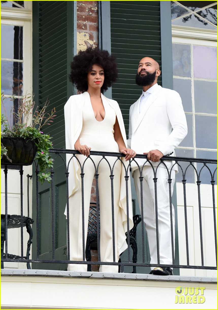 Solange Knowles Wears A White Pantsuit On Her Wedding Day While Posing With Fiance Alan Ferguson On A Balcony Just Before The Wedding