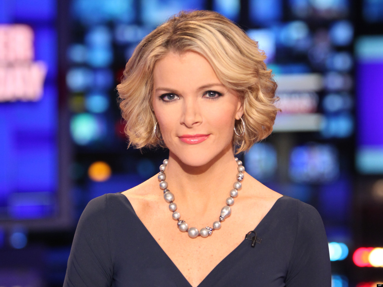 In this March 6, 2012 file photo provided by Fox News, Fox News anchor Megyn Kelly poses at the anchor desk at the Fox studios in New York. (Photo Credit: AP/Fox News, Alex Kroke)