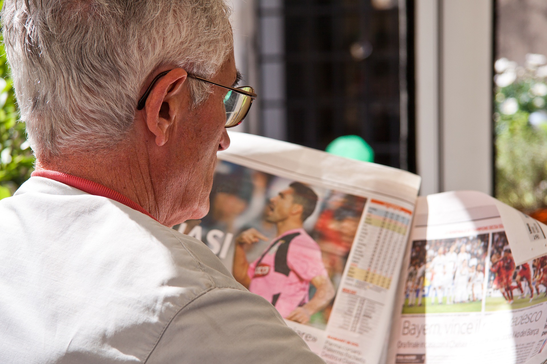 Reading newspaper