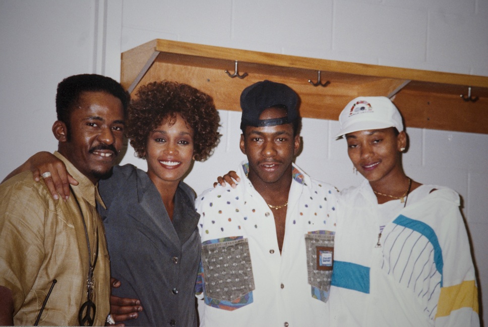 Whitney Houston (2nd left), Bobby Brown (3rd left) and Robyn Crawford (right) and an unidentified man in an undated photo