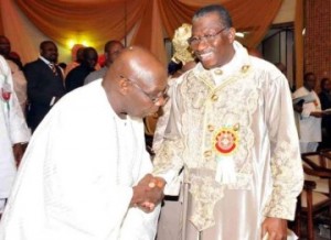 President Goodluck Jonathan having an handshake with former President Olusegun Obasanjo at Inebharapu wedding in Abuja on Saturday, January 10, 2015 (Photo credit: Punch News)