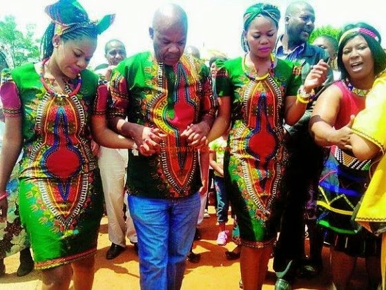 South African twin, Owami and Olwethu Mzazi with their Husband, Mzukiseni Mzazi (Photo Credit: Drum Magazine)