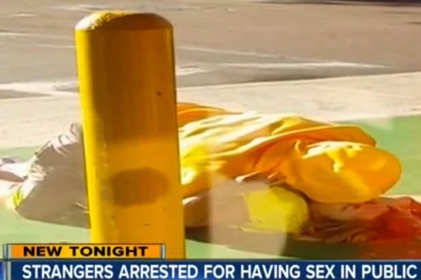 Randy couple having public sex in broad daylight in front of a dress store in Chula Vista, San Diego, USA. (Photo Credit: Mirror UK)