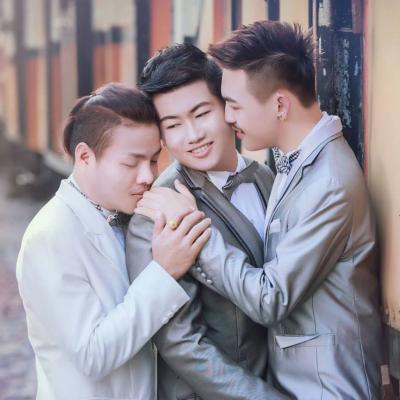 These three men got married in Thailand on Saturday, February 14, 2015. (Photo Credit: Gay Star News)