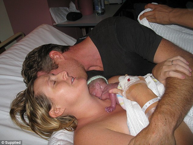 Miracle baby: Doctors told Australian couple, Kate and David Ogg there was nothing they could do to save baby Jamie but they hugged him back to life. (Photo Credit: Splash)
