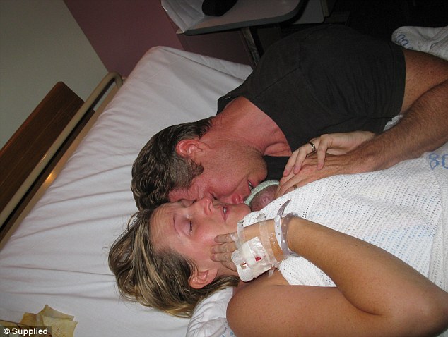Miracle baby: Doctors told Australian couple, Kate and David Ogg there was nothing they could do to save baby Jamie but they hugged him back to life. (Photo Credit: Splash)