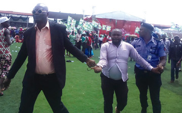 One of the men whisked away by security officials for disrupting First Lady Patience Jonathan's visit in Edo state on Saturday, March 14, 2015. (Photo Credit: Punch)
