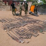 Assorted rifles discovered by troops in the suburb of Bama