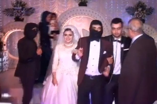 Egyptiwan couple host an ISIS-themed wedding inside a cage. (Photo Credit: Youtube)