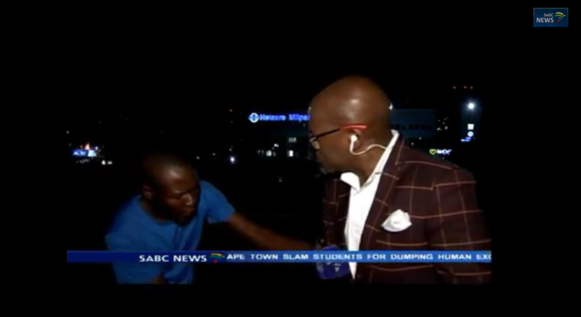 The moment the SABC TV anchor was robbed on live TV (Photo Credit: YouTube)