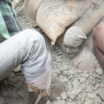 A man is pulled from rubble .The 7.9 Magnitude quake struck 77km north west of Kathmandu, Nepal (Photo Credit:www.rte.ie)