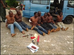 The Seven men who were caught by security operatives with matchets, dane guns and charms (photo credit; NaijaLoaded.com.ng)