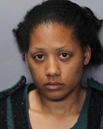 Porche Latric Wright, was arrested in the mid hours of Saturday, April 4, 2015 at her house in Sacramento, California for pouring gas on her 7-year-old daughter and setting her ablaze. (Photo Credit: Sacramento Police)