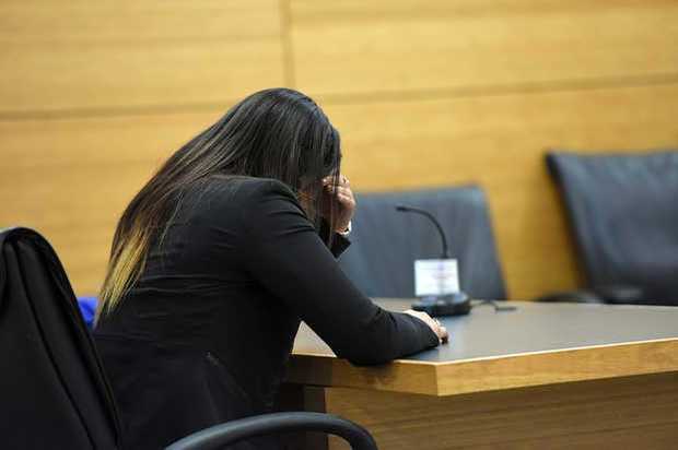 Elissa Alvarez, 20, cries softly on Monday, May 4, 2015 as a jury returns a verdict of guilty on a charge of lewd and lascivious exhibition after multiple witnesses reported to law enforcement that he and his girlfriend were having sex on Cortez Beach. (Photo Credit: Bradenton Herald)