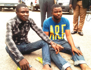 The two cooks from Benin Republic, Victor Hounkpe and David Amusu, who allegedly poisoned the meal of a family so they would cart away with gold and other valuables in the Lekki area of Lagos State. (Photo Credit: Punch)