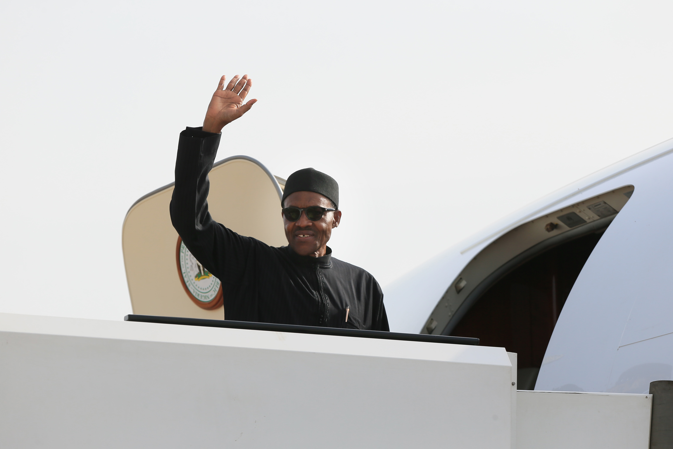 Buhari in Plane Flying Featured Muhammadu Buhari