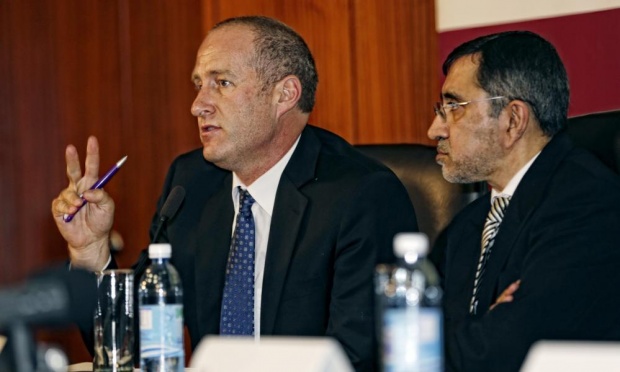Prof Van der Merwe (L) and Prof Rafique Moosa at a press conference in March, 2015 where they announced the successful penis transplant. (Photo Credit: AFP/Getty Images)