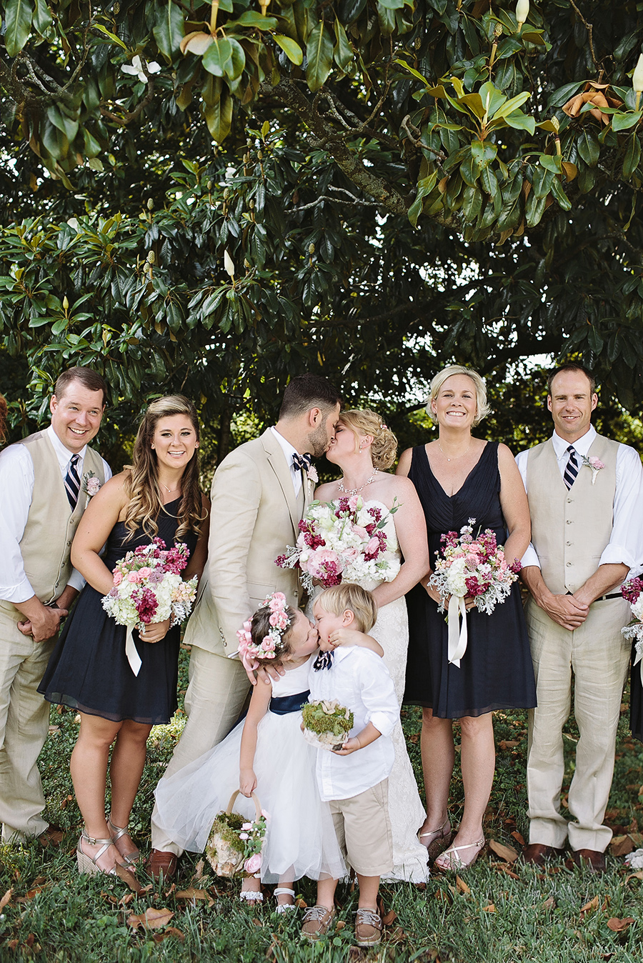 Little girl steals her mother's moment in bridal photo (Credit: Leah Bullard Photography)