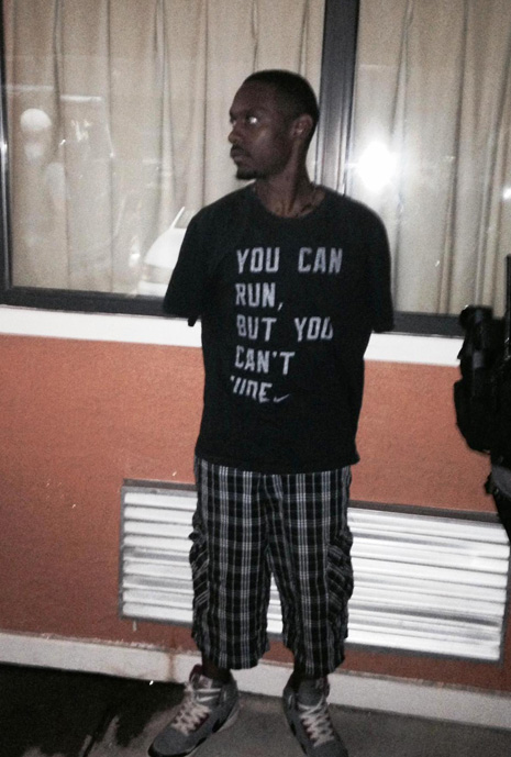 26-year-old Tieren Watson, who was apprehended in the late hours of Tuesday, June 16, 2015 was wearing a t-shirt with an inscription that reads, “You can run, but you can’t hide”. (Photo Credit: Smoking Gun)