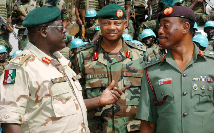 Maj.Gen Henry Ayoola(r) with Maj.Gen MD Isah,Commander Infantry Corps(l) and Brig Gen Paul Boroh(c) pictured in May 2012