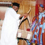President Goodluck Jonathan left Receving a Gift of a Talking drum from the  Alafin  of Oyo Oba Lamidi Olayiwola Adeyemi  in his Palace in Oyo 15th Feb 2014