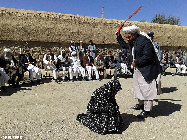 Marred woman being flogged 100 strokes publicly as punishment for committing adultery. (Photo Credit: Reuters)
