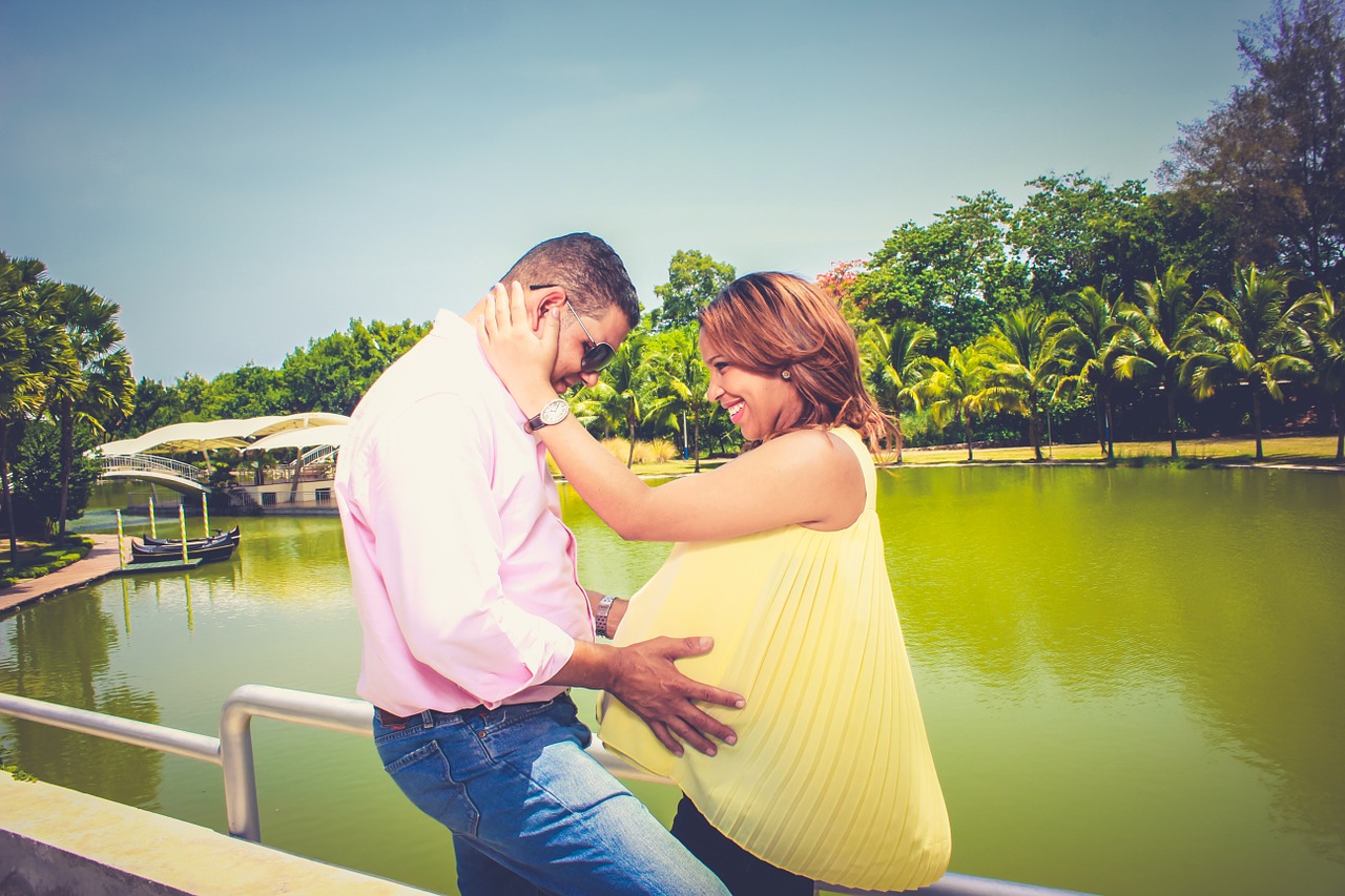 couple love kiss pregnant pregnancy, gestures
