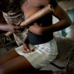 BR92EN Breast ironing with spade in Douala Cameroon.