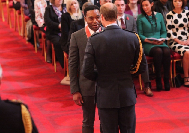 Chiwetel Ejiofor receives his medal from Prince William | Yui Mok/PA