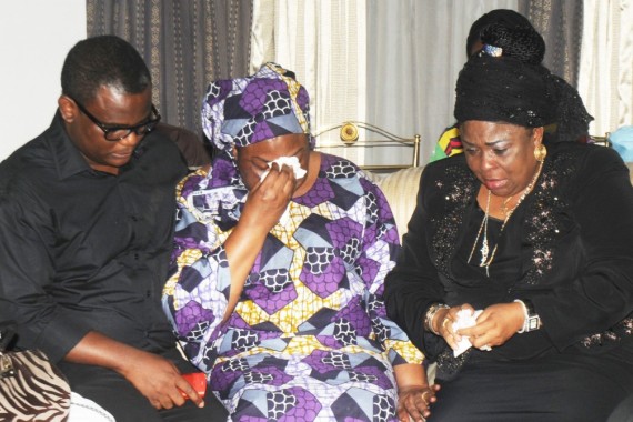 Dame Patience Jonathan breaks down in tears as she sat close to late Diepreye Alamieyeseigha's son and widow, Mrs Margaret Alamieyeseigha on Tuesday, October 13, 2015 | NAN